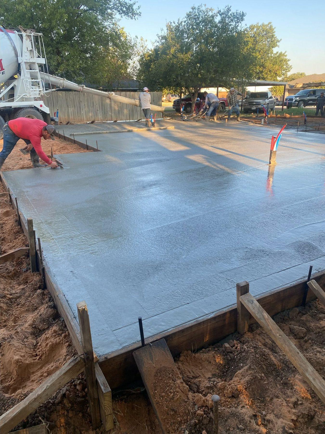 Finishing a freshly poured concrete slab